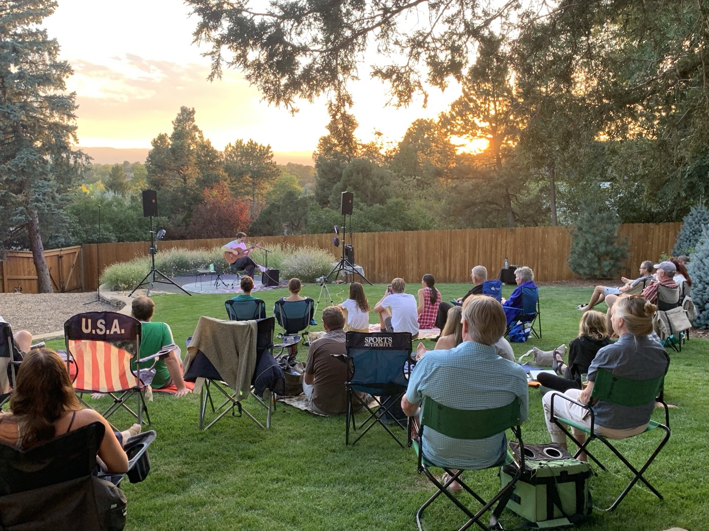Paul Spring performing at golden hour